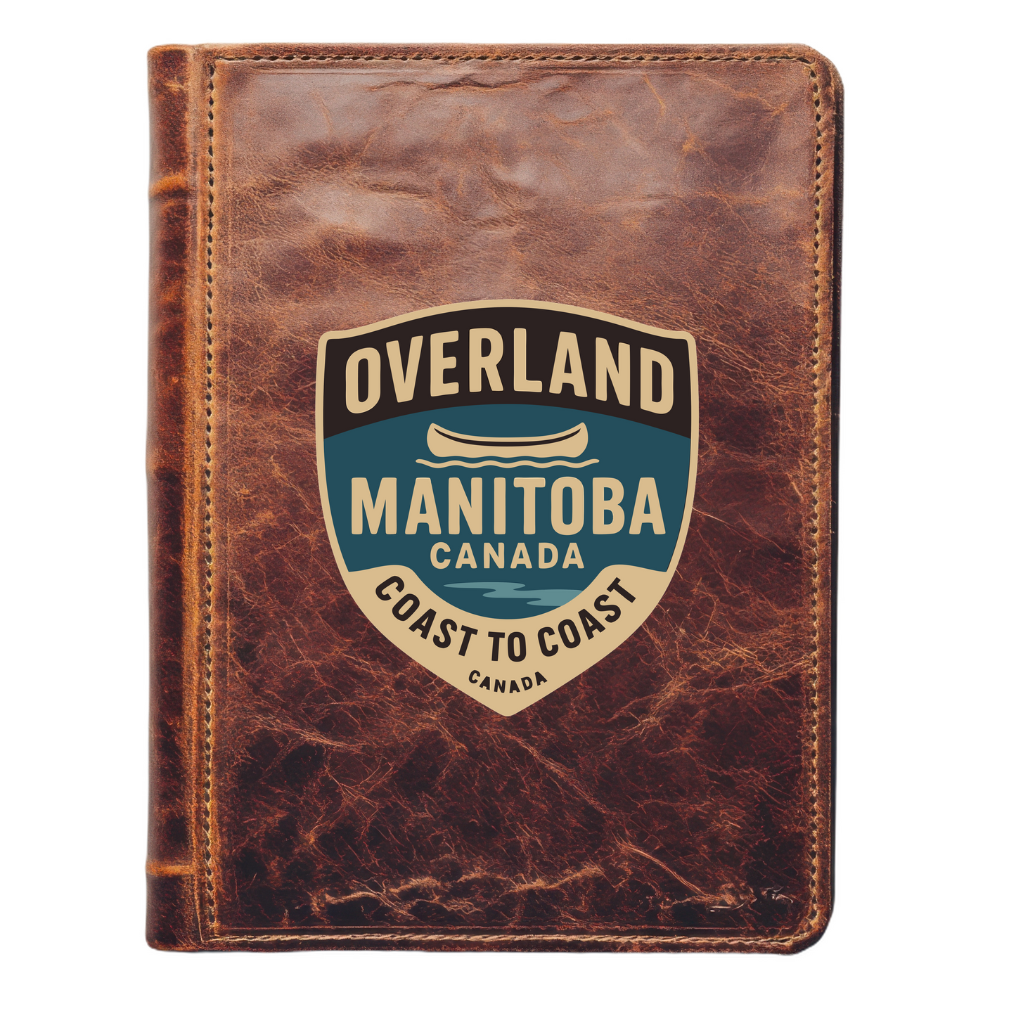 A woman in an orange shirt and green shorts stands next to a blue canoe labeled 'Overland Manitoba Coast to Coast' in a scenic outdoor setting.