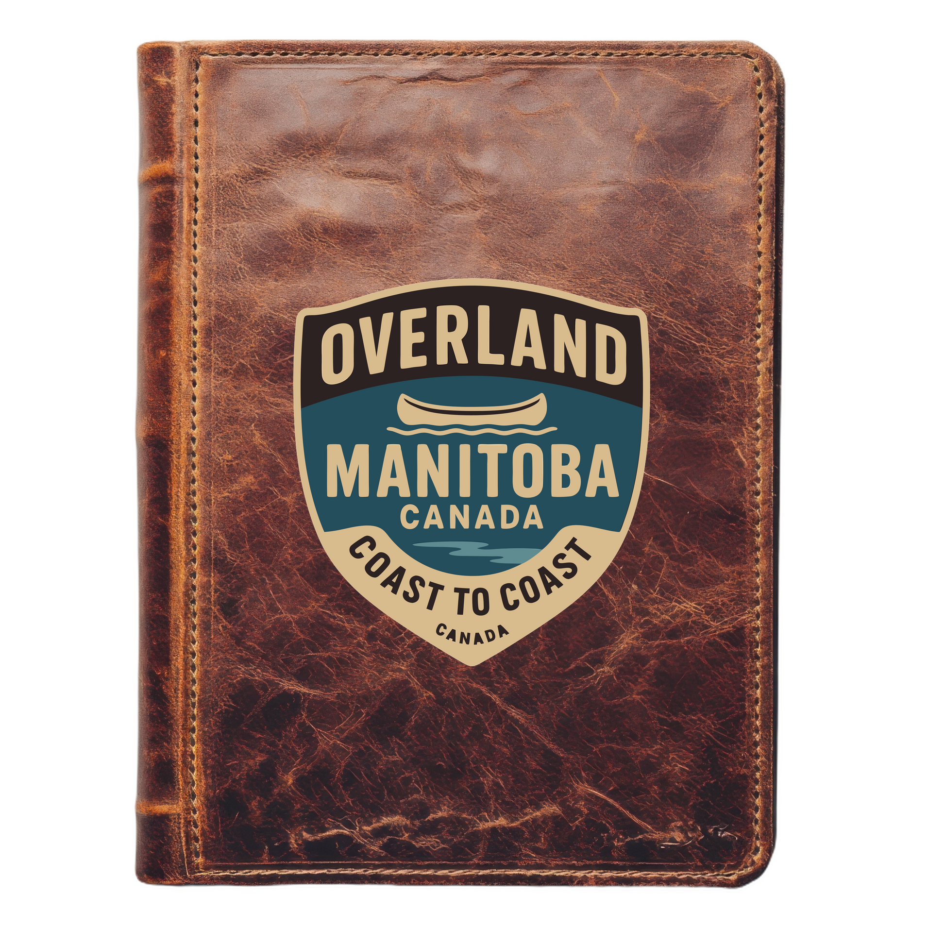 A woman in an orange shirt and green shorts stands next to a blue canoe labeled 'Overland Manitoba Coast to Coast' in a scenic outdoor setting.