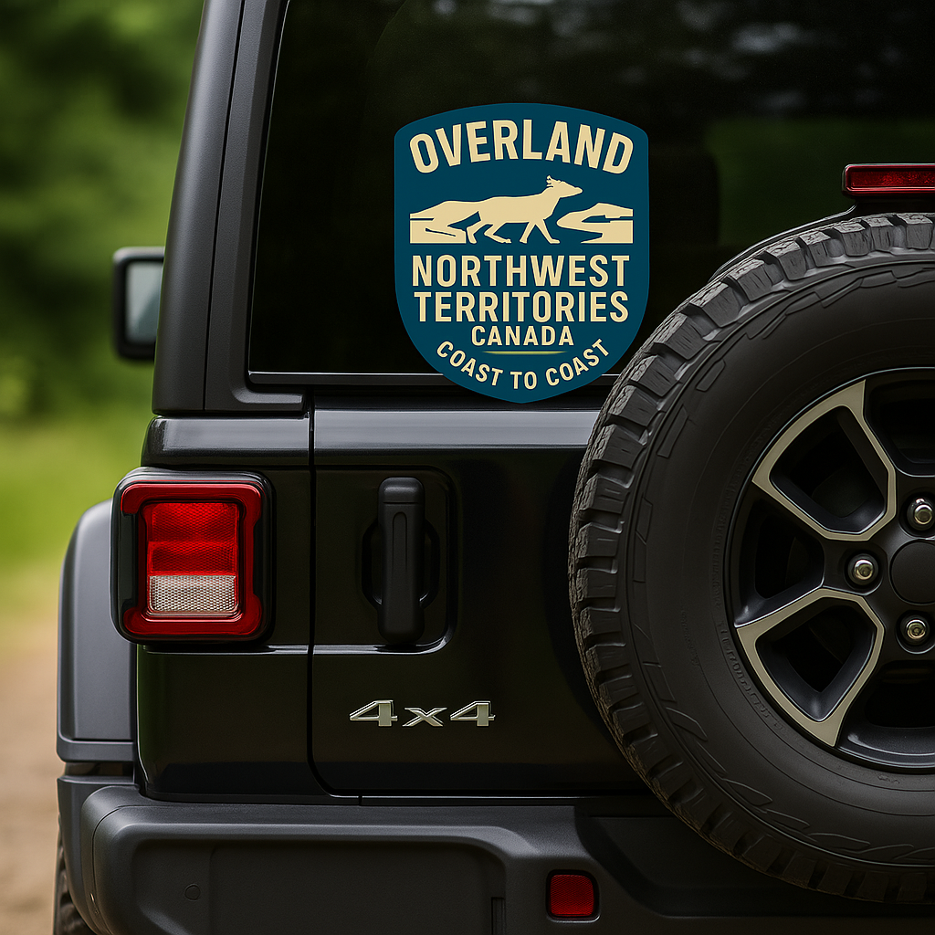 Olive green backpack decal featuring the OVERLAND NORTHWEST TERRITORIES CANADA emblem with a dog and wolf design, symbolizing wildlife and nature.