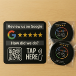 A 3" round rigid acrylic counter plaque and a 6" round vinyl window decal from the Tap To Trust Pro Bundle, featuring NFC and QR code technology, designed for businesses to encourage Google reviews at reception desks and entry points, showcasing a profess