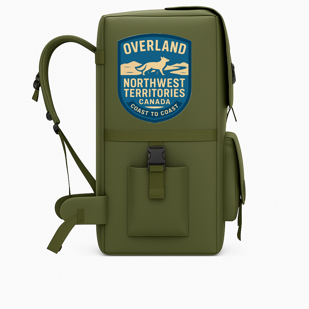 Olive green backpack decal featuring the OVERLAND NORTHWEST TERRITORIES CANADA emblem with a dog and wolf design, symbolizing wildlife and nature.